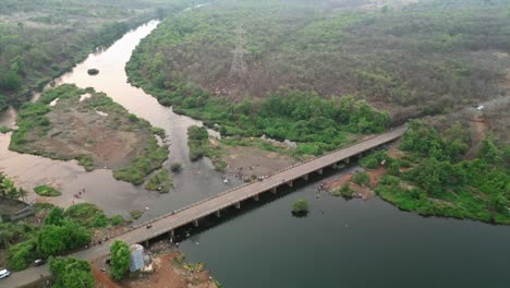 Ambeshiv-kh-Badlapur,-Maharashtra-barvi-river-drone-shot-sunny-day-bridge