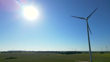 View-of-a-wind-turbine-seen-in-full-sunlight,-renewable-energy-sources