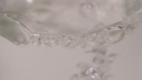 Slow-motion-footage-of-water-splashes-in-bottle