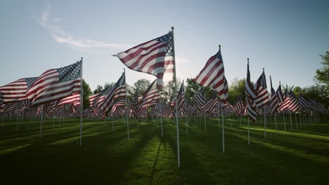 American-Flags-at-Sunset-Slow-Motion-Low-Angle-with-Sunbursts