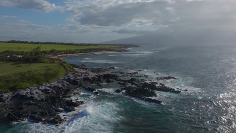 Dramatic-forward-aerial-by-Ho’okipa-at-cloudy-North-Shore-of-Maui