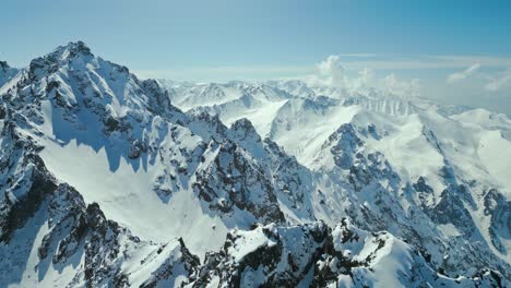 Beautiful,-breathtaking,-aerial-view,-Kazakhstan-mountain-range,-snow