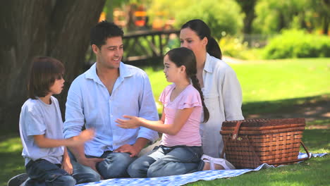 Parents-on-a-picnic-with-their-children-