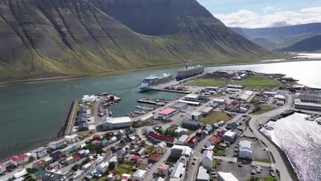 Aerial-View-of-Cruise-Ships-in-Port-of-Isafjordur,-Westfjords,-Iceland-on-Sunny-Day-60fps