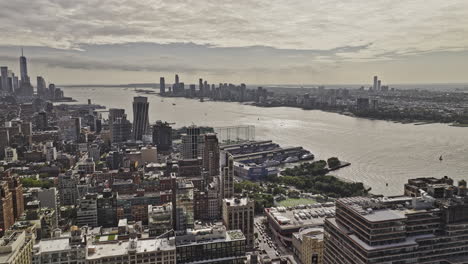 NYC-New-York-Aerial-v443-drone-flyover-Chelsea-capturing-cityscape-of-Lower-Manhattan-and-waterfront-piers-along-Hudson-river-overlooking-at-Jersey-city---Shot-with-Mavic-3-Pro-Cine---September-2023