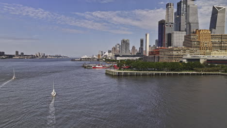 NYC-New-York-Aerial-v434-cinematic-low-drone-flyover-Hudson-river-capturing-waterfront-parks-and-urban-cityscape-views-of-Chelsea,-Midtown-and-Manhattan---Shot-with-Mavic-3-Pro-Cine---September-2023