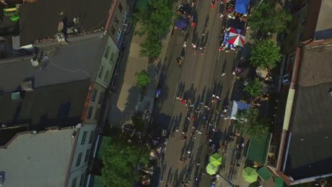 Taste-of-Italy-Along-College-Street-in-Toronto-Overhead-with-a-Drone-Looking-Down,-Canada