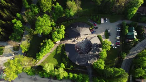 Aerial-Footage-of-Outdoor-Concert-Stage-in-Park-at-Sunset