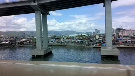 Filipinas,-Cebú:-El-Vídeo-Captura-Una-Vista-De-La-Zona-Costera-De-La-Ciudad-De-Cebú,-Vista-Desde-El-Interior-De-Un-Taxi