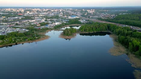 View-of-the-blue-lake-and-the-buildings-of-the-city's-industrial-district