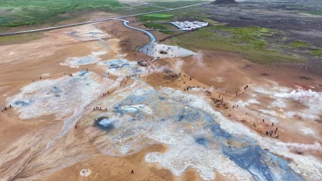 Aerial-View-of-Vapor-and-Geysers-in-Geothermal-Area-of-Iceland,-Drone-Shot