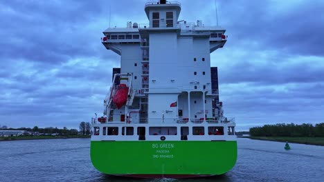 BG-Green-Freight-Line-Ship-On-A-Cloudy-Day-Sailing-In-Barendrecht-Near-Rotterdam,-South-Holland,-Netherlands