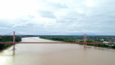 Witness-the-majestic-beauty-of-the-Bridge-over-Madre-de-Dios-River-in-this-panoramic-view-of-Puerto-Maldonado
