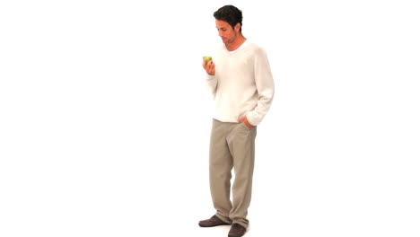 Relaxed-man-eating-an-apple