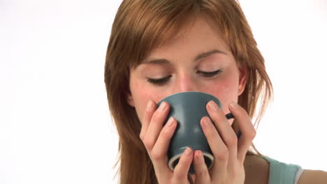 Woman-drinking-a-cup-of-Coffee