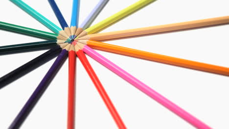Color-pencils-joined-at-their-top-rotating-