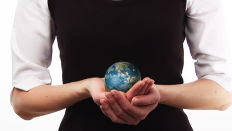 Businesswoman-holding-a-globe-in-her-hand-2