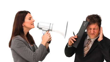 Businesswoman-giving-orders-through-a-megaphone