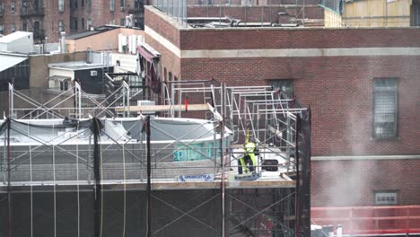 Construction-Worker-Preparing-Facade-For-Bricks