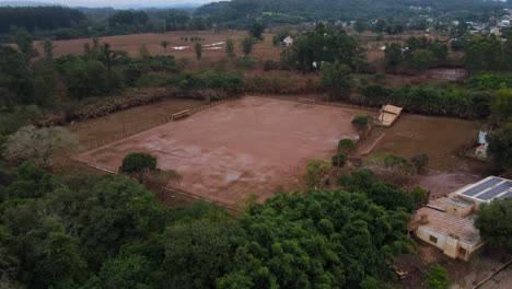 South-Brazil-Floods-2024---Drone-shot-of-aftermath-of-floods-in-soccer-court-in-Sao-Sebastiao-do-Cai-City---Rio-Grande-do-Sul
