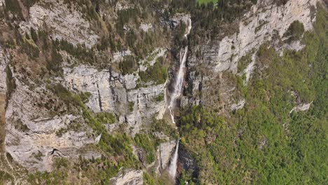 Waterfalls-cascading-down-lush-mountains-in-Amden,-Betlis-near-Walensee,-Switzerland