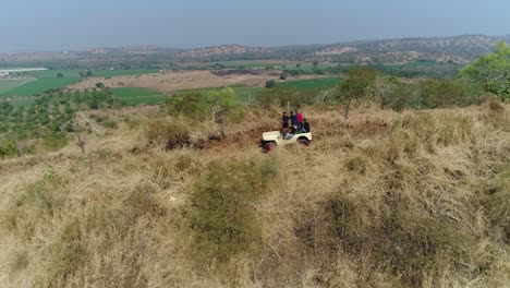 A-big-jeep-is-going-on-the-mountain-in-the-drone-camera