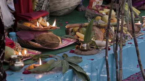 holy-religious-offerings-with-oil-lamp-and-fruits-for-hindu-sun-god-at-chhath-festival