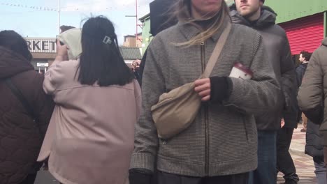 Slow-motion-of-a-pov-of-a-person-walking-at-the-Barras-in-Glasgow