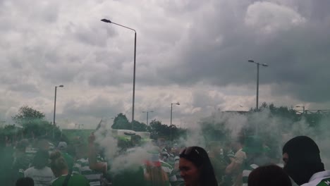 Celtic-fans-with-green-and-white-flares