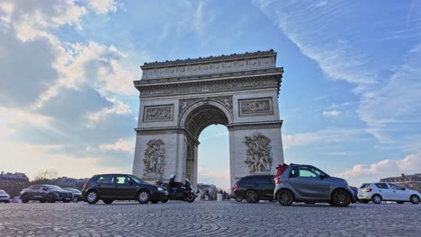 Triumphal-Arch-and-car-traffic,-Paris-in-France