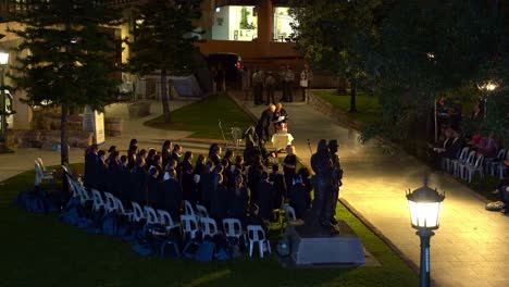 Brisbane-Girls-Grammar-School-Choir-performing-in-the-Nurses-memorial-candlelight-vigil-at-Anzac-Square-in-the-evening,-held-by-Centaur-Memorial-Fund-for-Nurses