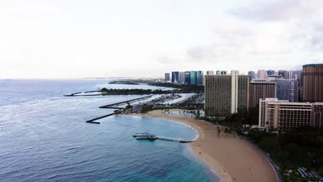 Drone-shot-approaching-Oahu's-Rainbow-Tower-and-Ala-Wai-Boat-Harbor