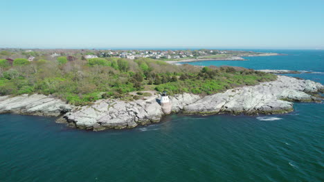 Aerial-view-of-Castle-Hill-Lighthouse-on-the-shores-of-Narragansett-Bay-in-Newport
