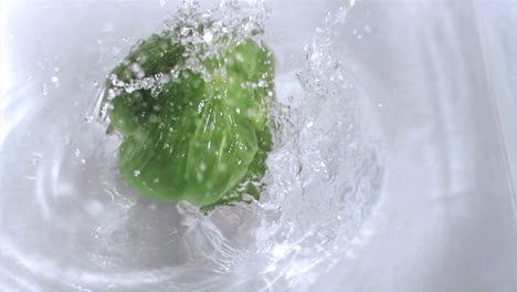 Pepper-falling-into-water-in-super-slow-motion