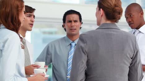 Business-people-having-a-conversation-at-break-time