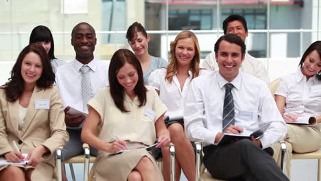 Front-view-of-smiling-business-people