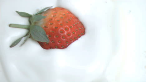 Strawberry-falling-into-milk-in-super-slow-motion