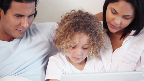 Family-using-laptop-together