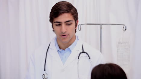 A-doctor-explaining-results-to-his-patient