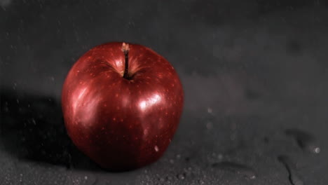 Water-dripping-on-apple-in-super-slow-motion