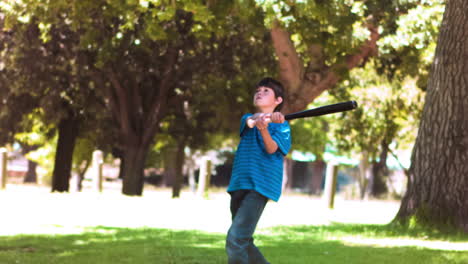 Boy-playing-baseball-in-slow-motion