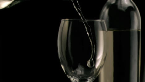 White-wine-being-poured-in-super-slow-motion