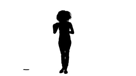 Silhouette-of-a-woman-throwing-money-notes