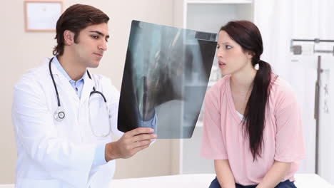 Doctor-explaining-a-Xray-to-his-patient