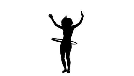 Silhouette-woman-using-a-hula-hoop