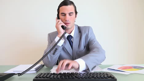 Businessman-talking-on-the-phone