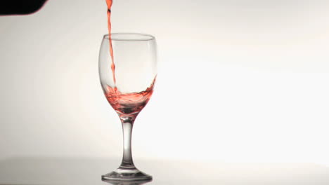 Red-wine-being-poured-in-super-slow-motion