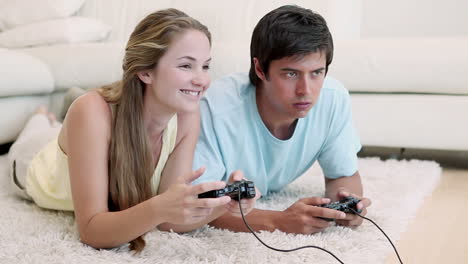 Woman-winning-in-a-video-game-against-her-boyfriend