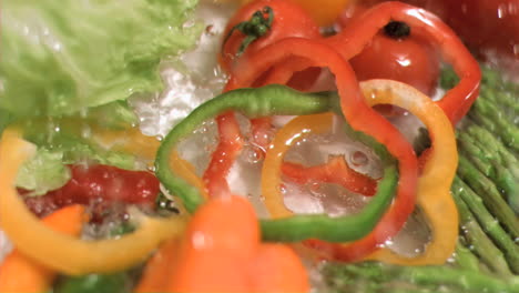 Water-falling-on-vegetables-in-super-slow-motion