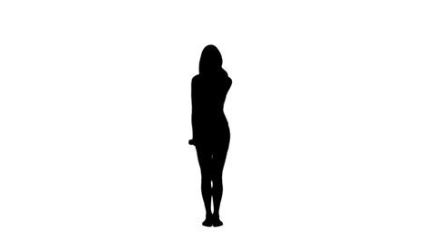 Silhouette-woman-standing-raising-her-arms